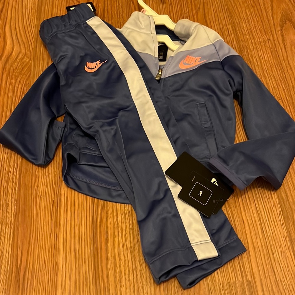 Nike track suit and warm up suit.